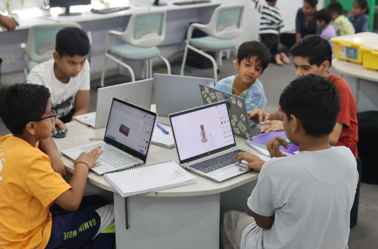 Indian kids learning 3D design on laptops at a STEAM education program at Mittyverse, Gurgaon